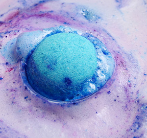 colorful bath bombs in water